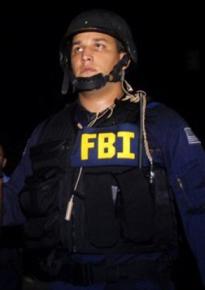 FBI agent in riot gear